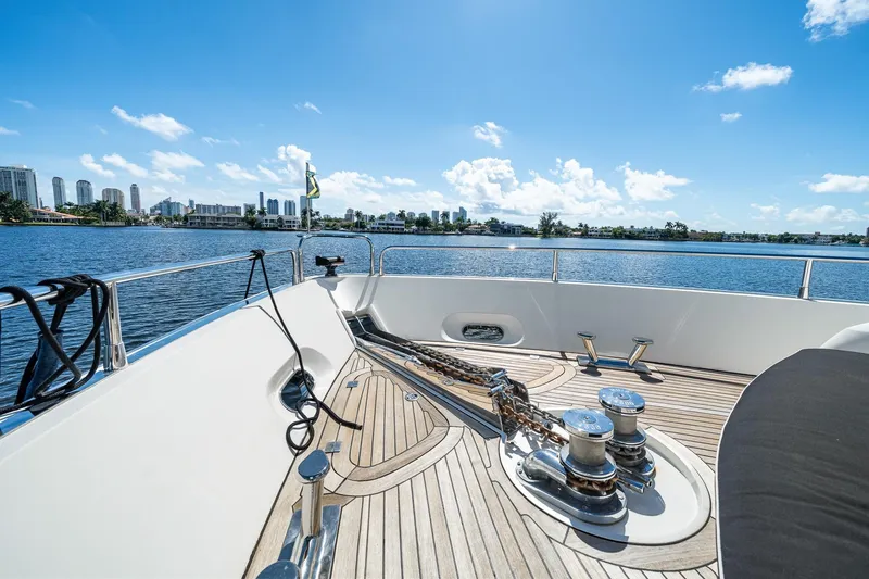 Slide: The Image of Sunseeker 90 Yacht 2008 deck view with city skyline and blue sky. - 46