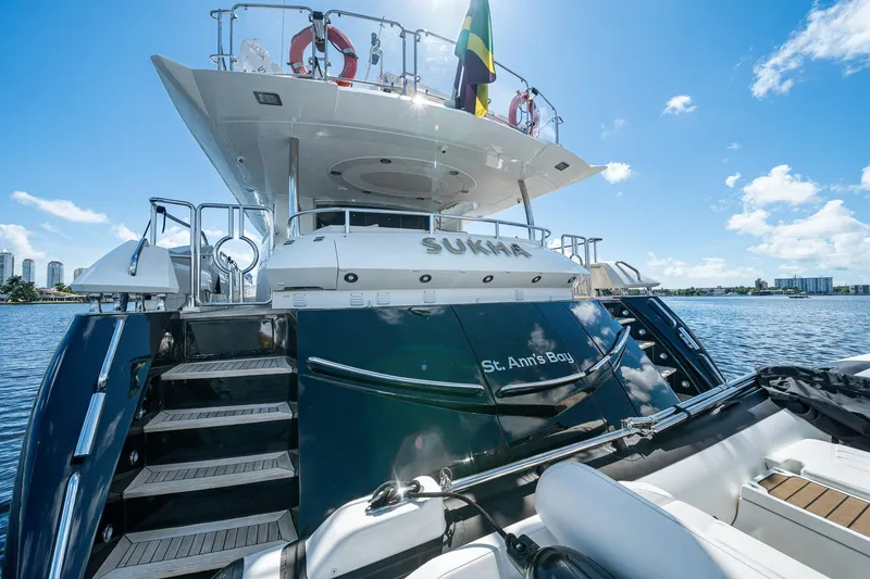 Slide: The Image of 2008 Sunseeker 90 Yacht on water, rear view, clear sky, luxury vessel. - 53