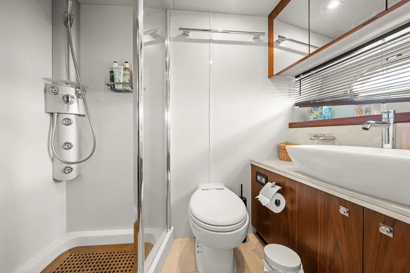Slide: The Image of Luxurious bathroom in 2008 Sunseeker 90 Yacht with modern fixtures and elegant design. - 65