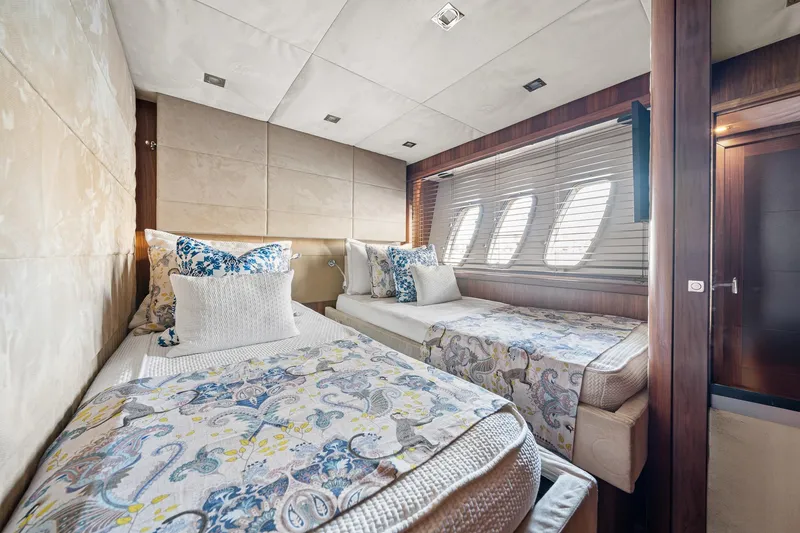 Slide: The Image of Luxurious twin bedroom in 2008 Sunseeker 90 Yacht with elegant decor and natural light. - 68