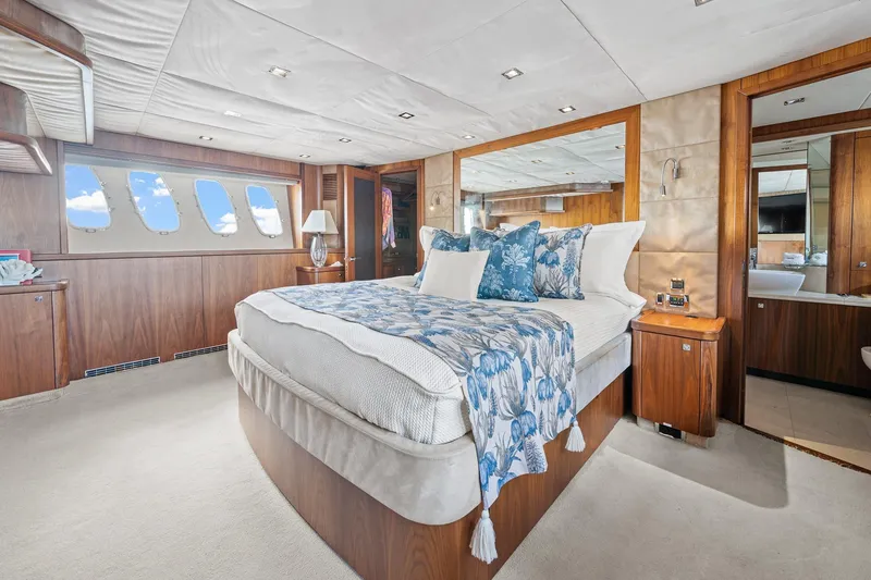 Slide: The Image of Luxurious bedroom interior of 2008 Sunseeker 90 Yacht with elegant wood paneling. - 75