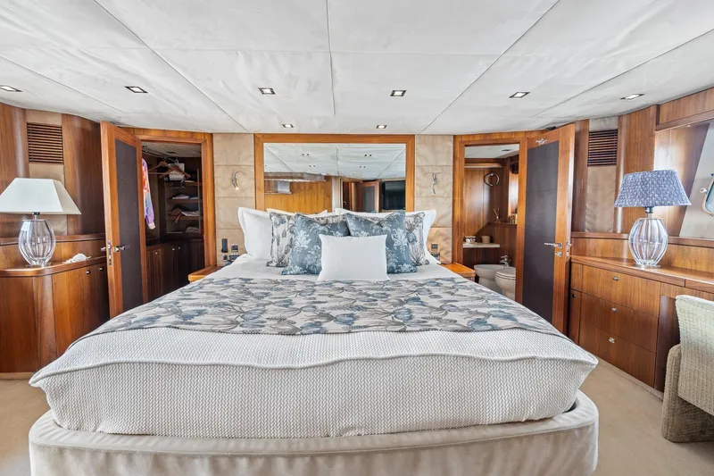 Slide: The Image of Luxurious bedroom interior of 2008 Sunseeker 90 Yacht with elegant wood finishes. - 76