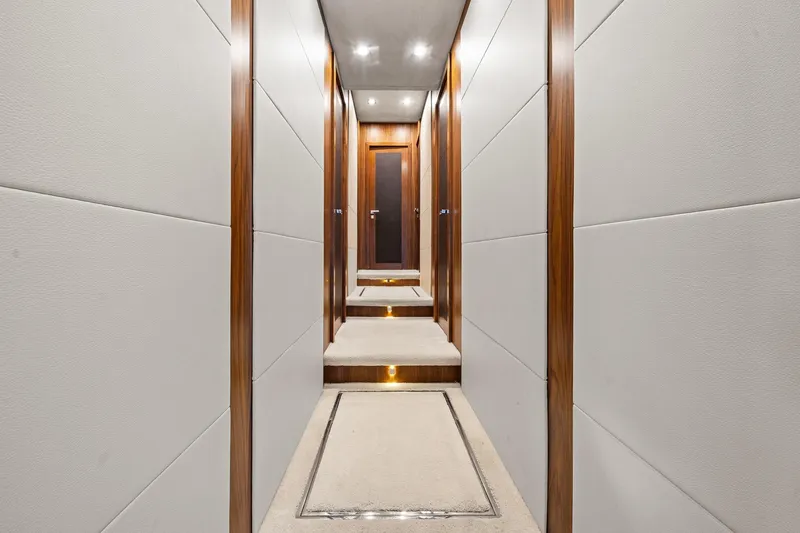 Slide: The Image of Luxurious hallway interior of 2008 Sunseeker 90 Yacht with elegant wood paneling. - 77