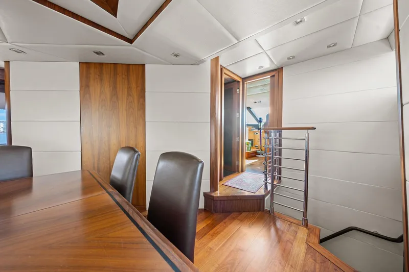Slide: The Image of Luxurious interior of 2008 Sunseeker 90 Yacht, featuring elegant wood finishes and modern design. - 87