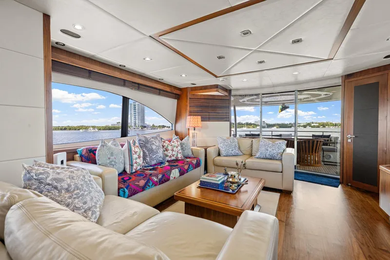 Slide: The Image of Luxurious interior of 2008 Sunseeker 90 Yacht with elegant seating and scenic water views. - 89