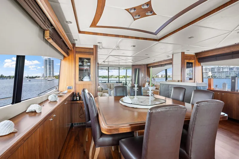 Slide: The Image of Luxurious interior of 2008 Sunseeker 90 Yacht with elegant dining area and waterfront view. - 91