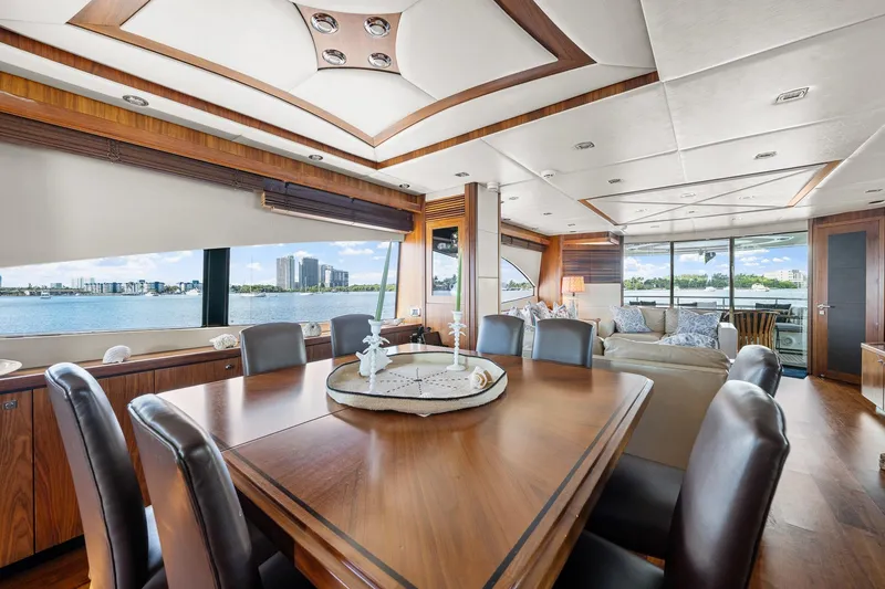 Slide: The Image of Luxurious interior of 2008 Sunseeker 90 Yacht with elegant dining and lounge area. - 92