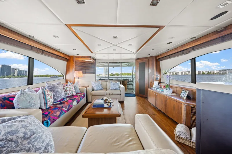 Slide: The Image of Luxurious interior of a 2008 Sunseeker 90 Yacht with elegant furnishings and panoramic windows. - 96