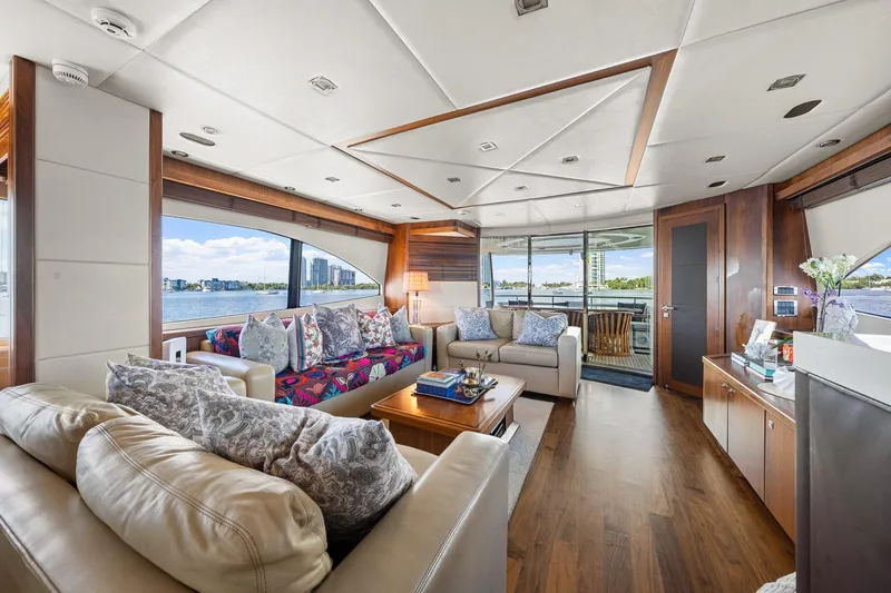 Slide: The Image of Luxurious interior of 2008 Sunseeker 90 Yacht with elegant seating and panoramic windows. - 97