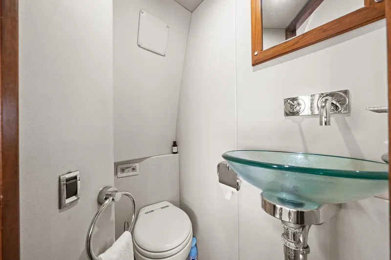 Slide: The Image of Luxurious bathroom in 2008 Sunseeker 90 Yacht with modern glass sink and elegant fixtures. - 99