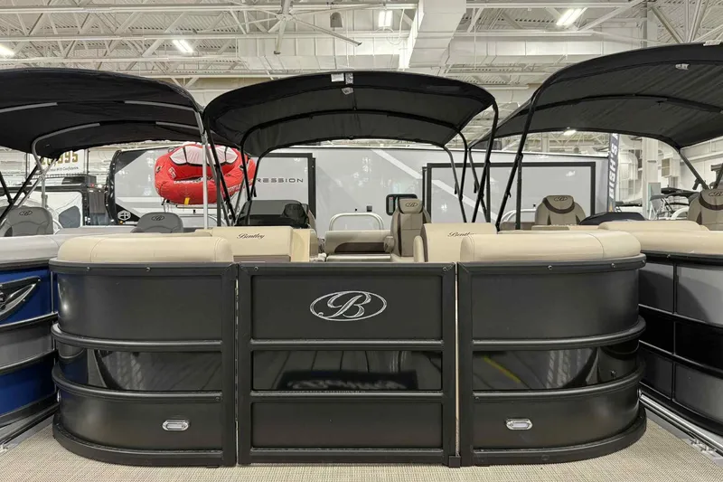 The Image of 2026 Bentley Pontoons Legacy 243 Swingback Dual Captain 3/4 Tube, showcased indoors. - 0