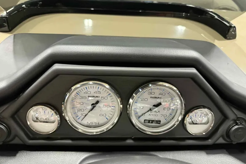 Slide: The Image of Dashboard of 2026 Bentley Pontoons Legacy 243 with speedometer and fuel gauge. - 10
