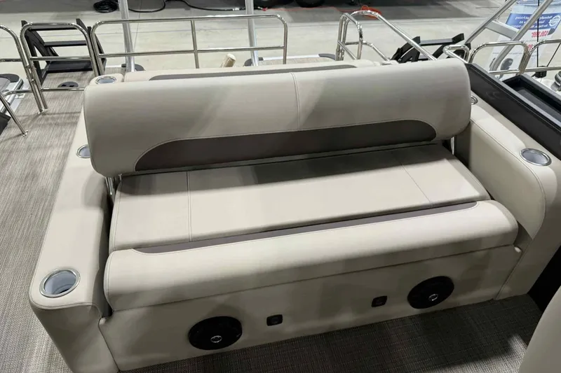 Slide: The Image of 2026 Bentley Pontoons Legacy 243 Swingback seating with cup holders and speaker system. - 14