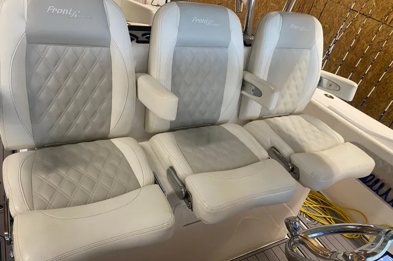 Slide: The Image of Luxury seating on 2022 Front Runner 39 CC boat with quilted upholstery. - 17