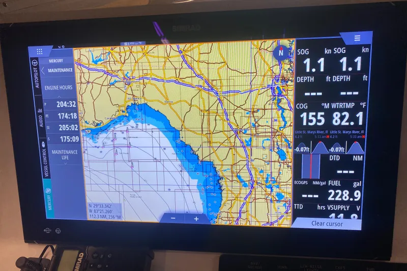 Slide: The Image of Navigation display on a 2022 Front Runner 39 CC boat, showing map and engine data. - 24