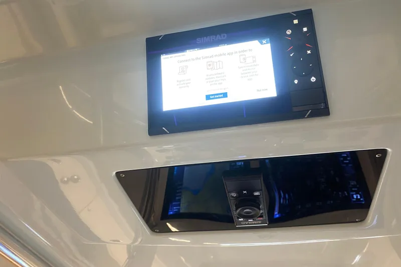 Slide: The Image of Simrad display on 2022 Front Runner 39 CC boat dashboard, showing connection instructions. - 26