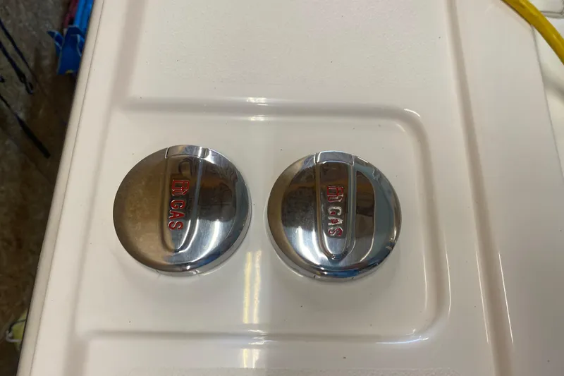 Slide: The Image of Chrome gas caps on 2022 Front Runner 39 CC boat. - 29