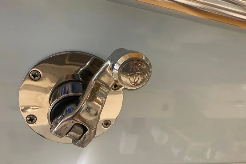 Slide: The Image of Chrome handle on 2022 Front Runner 39 CC boat, featuring a sleek design. - 31