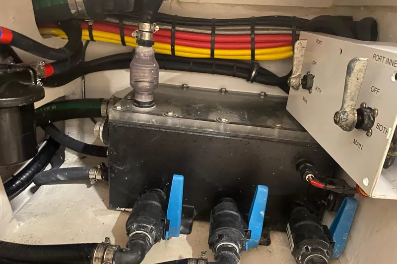 Slide: The Image of Engine compartment of 2022 Front Runner 39 CC boat with wiring and control panel. - 34