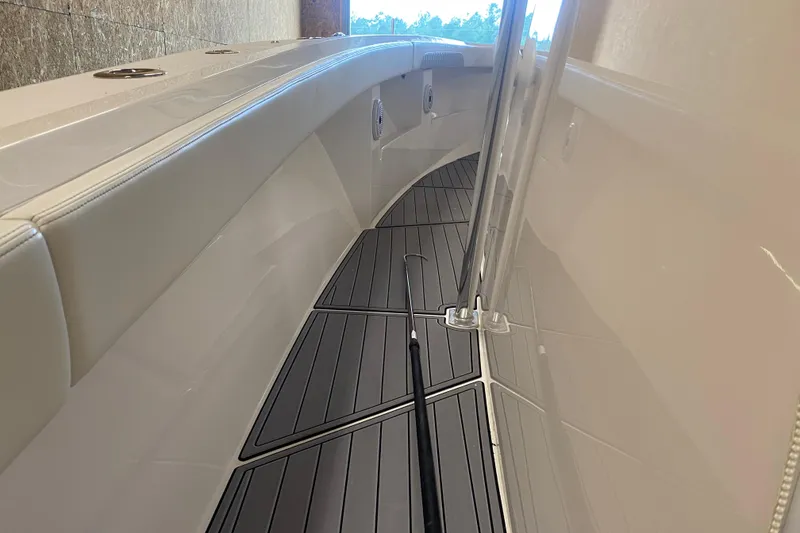 Slide: The Image of 2022 Front Runner 39 CC boat interior with sleek deck and railing. - 35