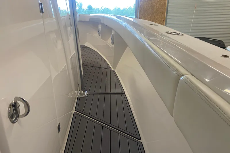 Slide: The Image of 2022 Front Runner 39 CC boat interior with sleek design and modern flooring. - 36