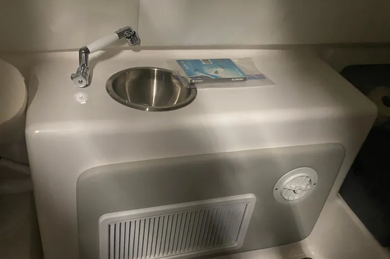 Slide: The Image of 2022 Front Runner 39 CC boat interior with sink and faucet. - 37