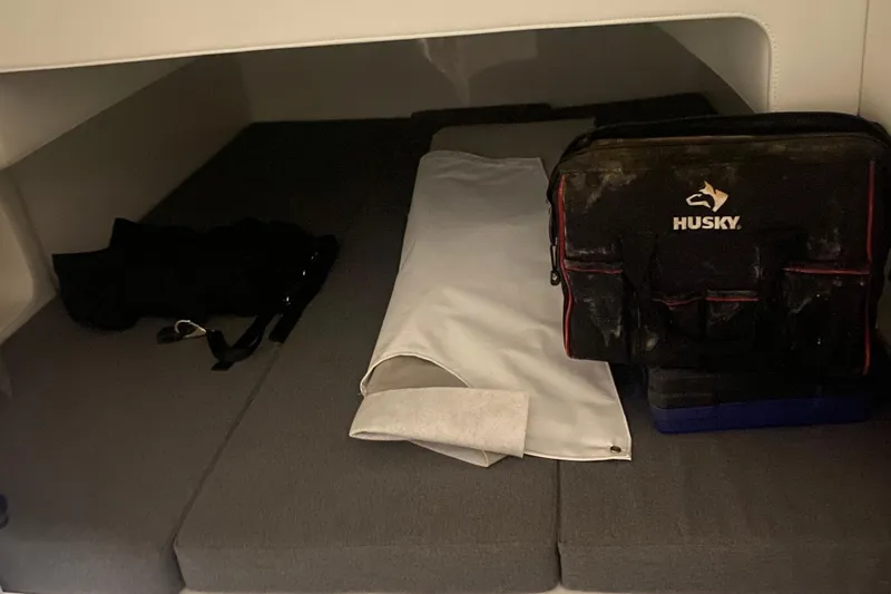 Slide: The Image of Interior storage space of 2022 Front Runner 39 CC with tools and equipment. - 39