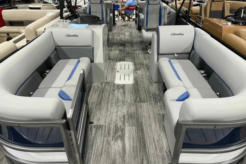 The Image of 2026 Bentley Pontoons Legacy 223 Navigator Full Tube interior with gray seating and modern design. - 0
