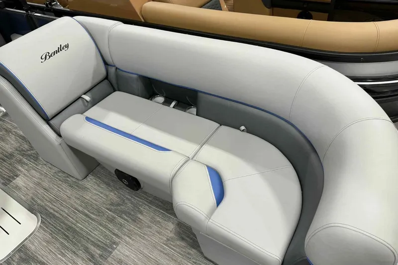 Slide: The Image of 2026 Bentley Pontoons Legacy 223 Navigator Full Tube interior seating, featuring elegant gray upholstery. - 14