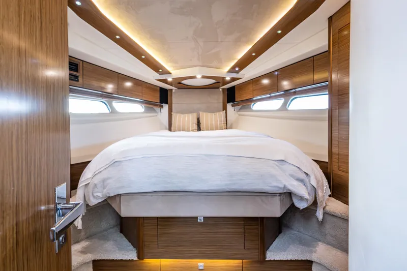 Slide: The Image of Luxurious bedroom interior of 2014 Cruisers Yachts 45 Cantius with modern design and cozy bedding. - 27