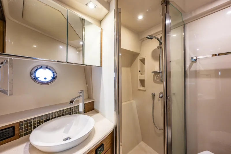 Slide: The Image of Luxurious bathroom in 2014 Cruisers Yachts 45 Cantius with modern fixtures and shower. - 31
