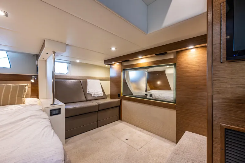 Slide: The Image of Luxurious interior of 2014 Cruisers Yachts 45 Cantius with modern furnishings and ambient lighting. - 34
