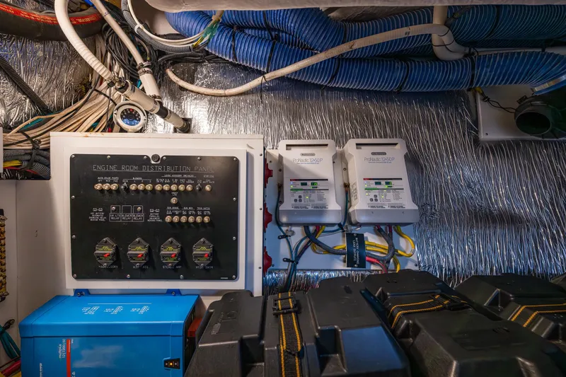 Slide: The Image of Engine room of 2014 Cruisers Yachts 45 Cantius with distribution panel and wiring. - 41