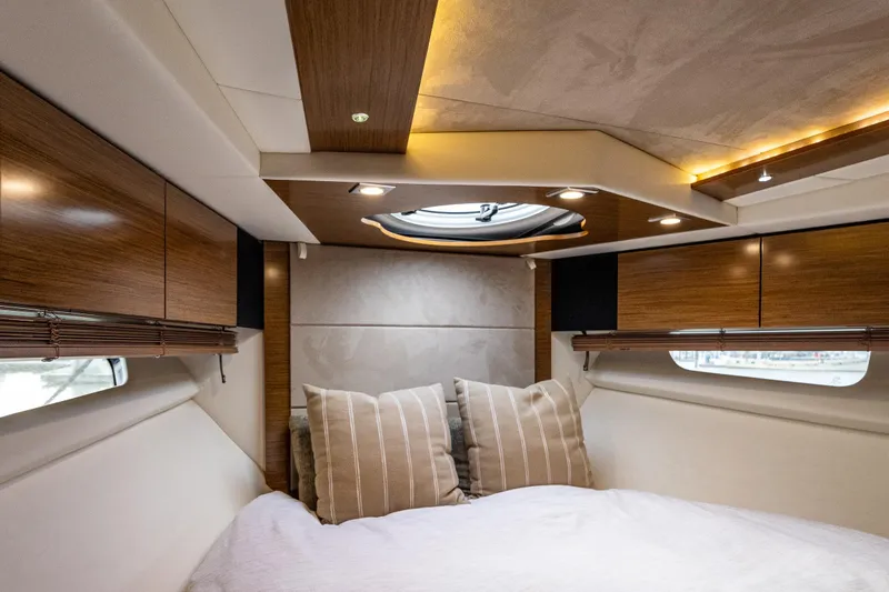 Slide: The Image of Luxurious cabin interior of 2014 Cruisers Yachts 45 Cantius with modern wood finishes. - 29