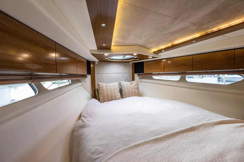 Slide: The Image of Luxurious cabin interior of 2014 Cruisers Yachts 45 Cantius with elegant wood finishes. - 30