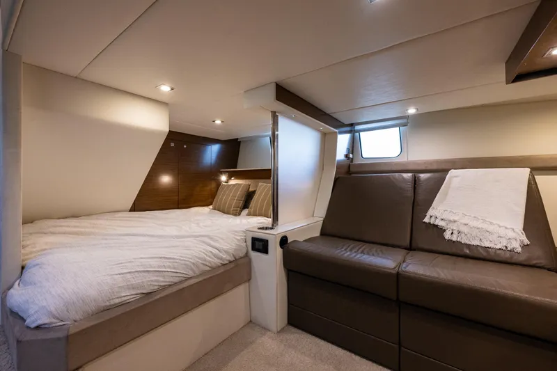Slide: The Image of Luxurious interior of 2014 Cruisers Yachts 45 Cantius with bed and leather seating. - 37