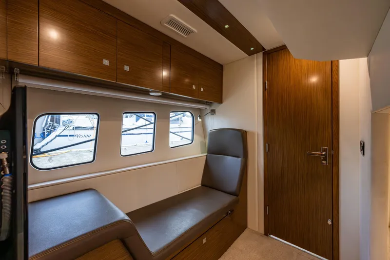 Slide: The Image of Luxurious interior of 2014 Cruisers Yachts 45 Cantius with sleek wood finishes and comfortable seating. - 38