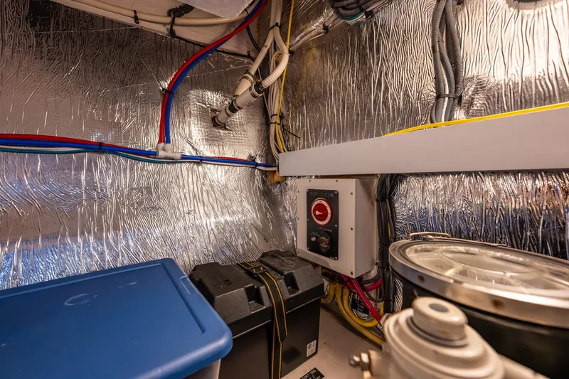 Slide: The Image of Engine room of 2014 Cruisers Yachts 45 Cantius with wiring and equipment. - 42