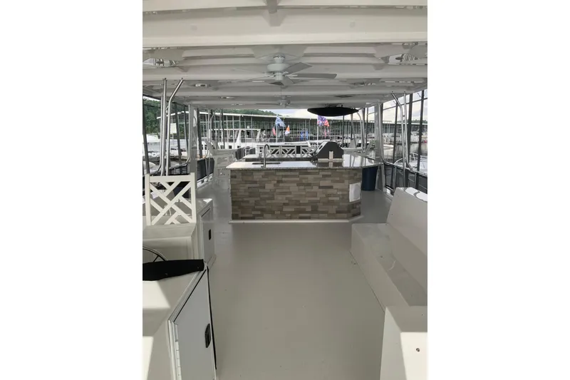 Slide: The Image of 2023 Sumerset 18 x 81 houseboat interior with modern design and spacious layout. - 12