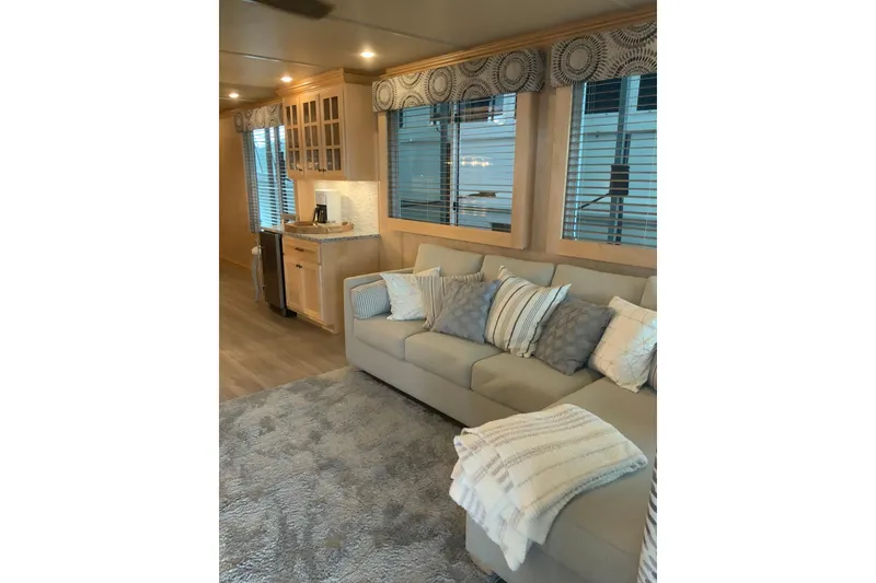 Slide: The Image of Luxurious interior of 2023 Sumerset 18 x 81 houseboat with cozy seating and modern decor. - 42
