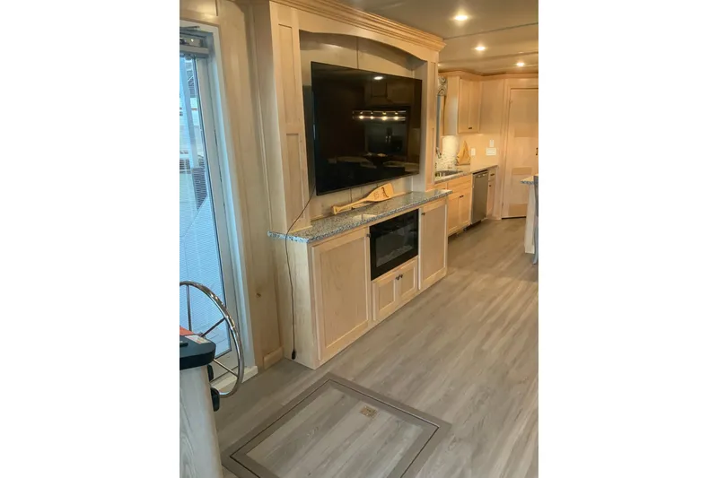 Slide: The Image of Luxurious interior of 2023 Sumerset 18 x 81 houseboat with modern kitchen and entertainment area. - 43