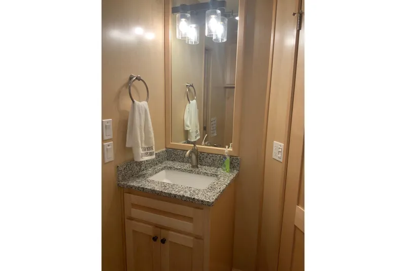 Slide: The Image of Modern bathroom vanity with granite countertop in 2023 Sumerset 18 x 81 houseboat. - 64