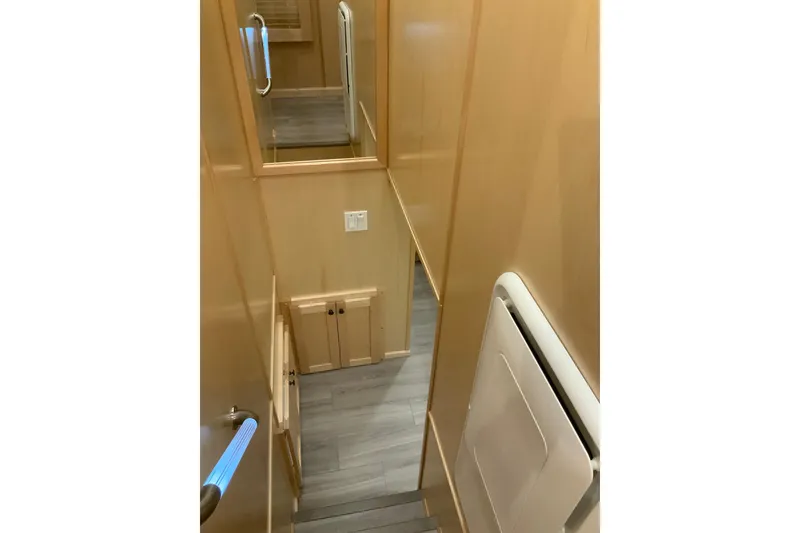 Slide: The Image of Interior of 2023 Sumerset 18 x 81 houseboat with wooden stairs and modern design. - 67