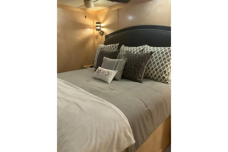 Slide: The Image of Luxurious bedroom interior in 2023 Sumerset 18 x 81 houseboat, featuring elegant bedding and lighting. - 73