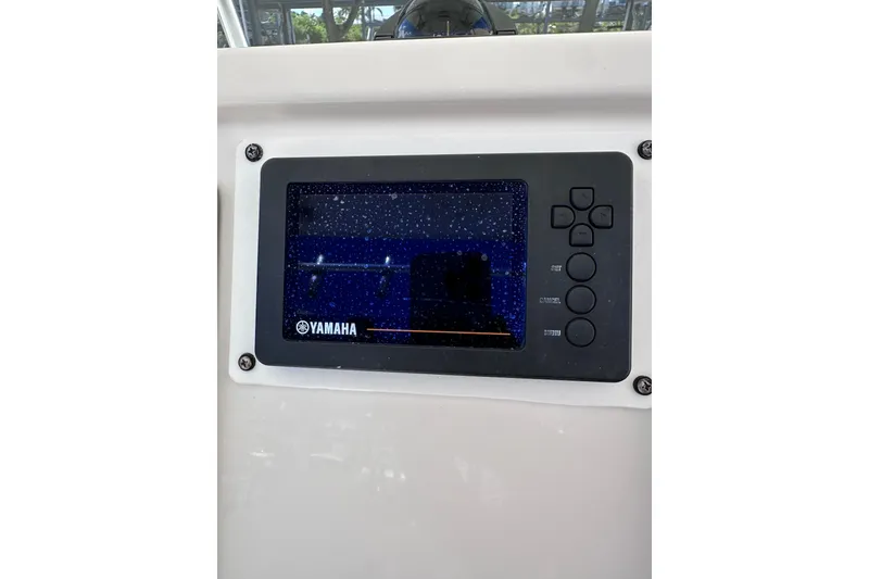Slide: The Image of Yamaha display on 2011 Robalo R300 Center Console boat dashboard. - 17
