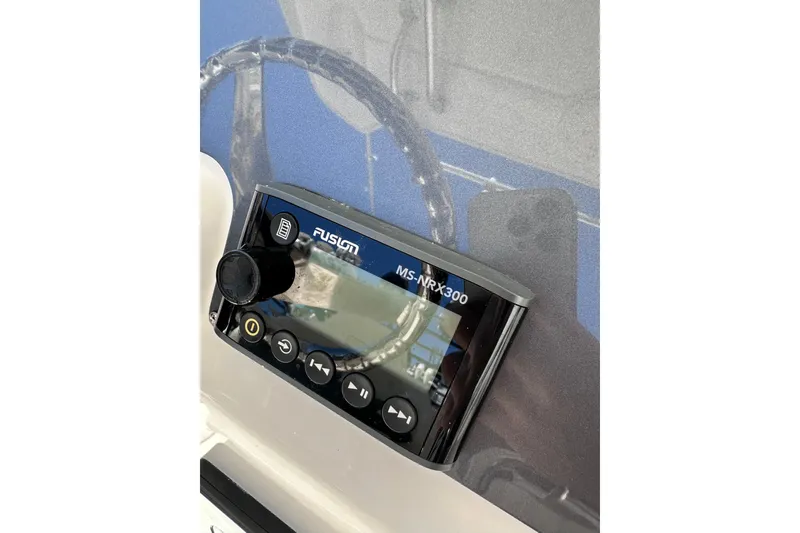 Slide: The Image of Fusion MS-NRX300 marine stereo on 2011 Robalo R300 Center Console. - 18