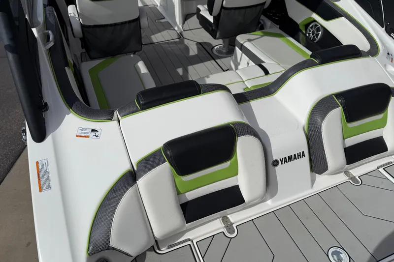Slide: The Image of 2022 Yamaha Boats 212XD interior with stylish seating and modern design. - 21