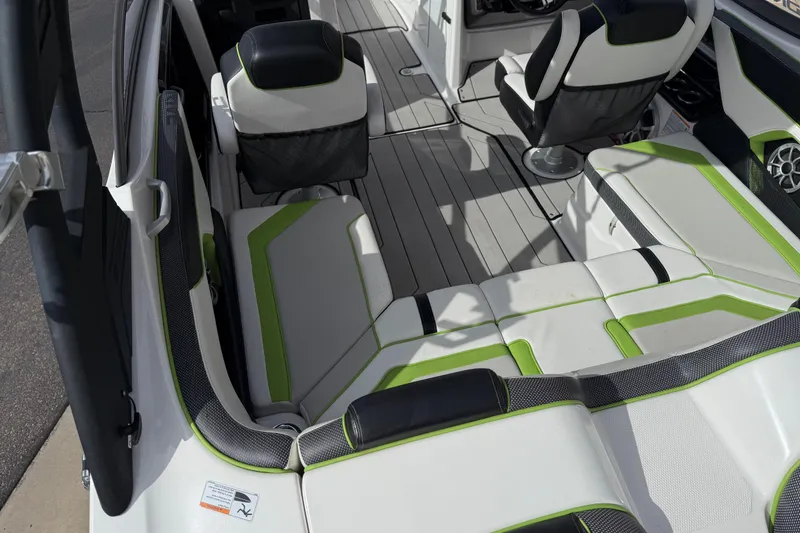 Slide: The Image of 2022 Yamaha Boats 212XD interior with stylish seating and modern design. - 25