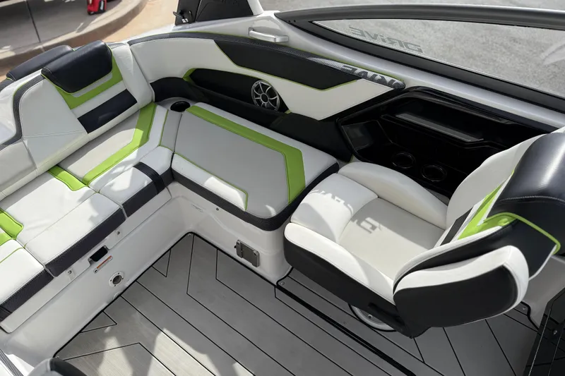 Slide: The Image of 2022 Yamaha Boats 212XD interior with modern seating and sleek design. - 28