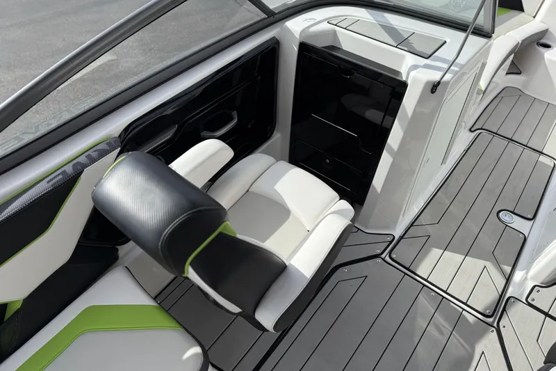 Slide: The Image of 2022 Yamaha Boats 212XD interior with sleek seating and modern design. - 30